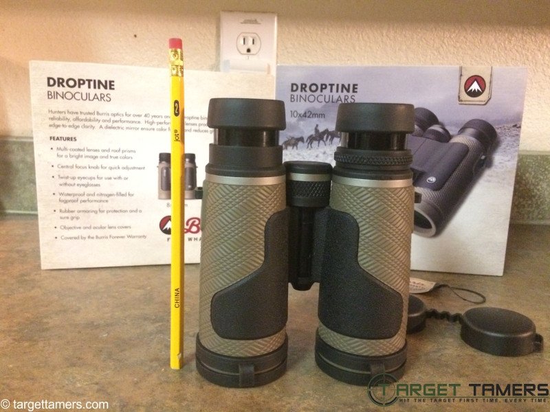 Size comparison of Burris Droptine 10x42 binoculars next to a pencil