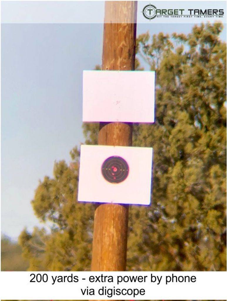 Photo of bullet groupings at 200 yards taken through Carson spotter at 45x with extra power via phone and digiscope