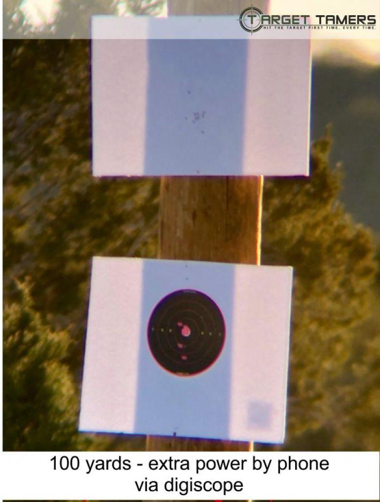 Photo of bullet groupings at 100 yards taken through Everglade spotter at 45x with extra power of phone via digiscope