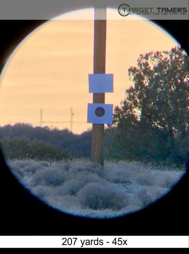 Photo of bullet groupings at 207 yards taken through Everglade spotter at 45x