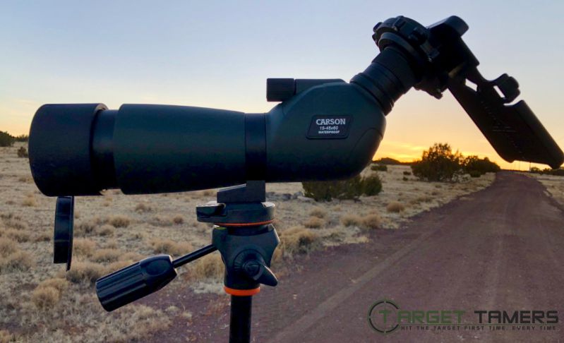 Everglade spotting scope set up on tripod with lens cap flipped down