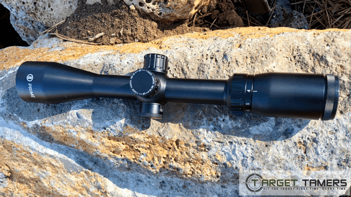Bushnell Prime rifle scope sitting on a rock