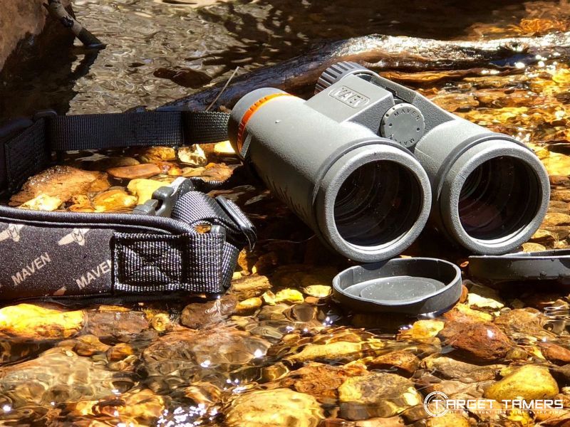 Binoculars sitting in water