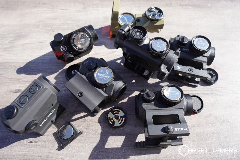 Group pic of red dot sight battery compartments