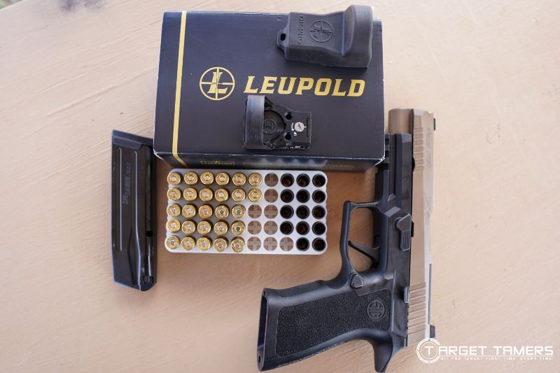 Handgun, ammo and Leupld DeltaPoint Pro
